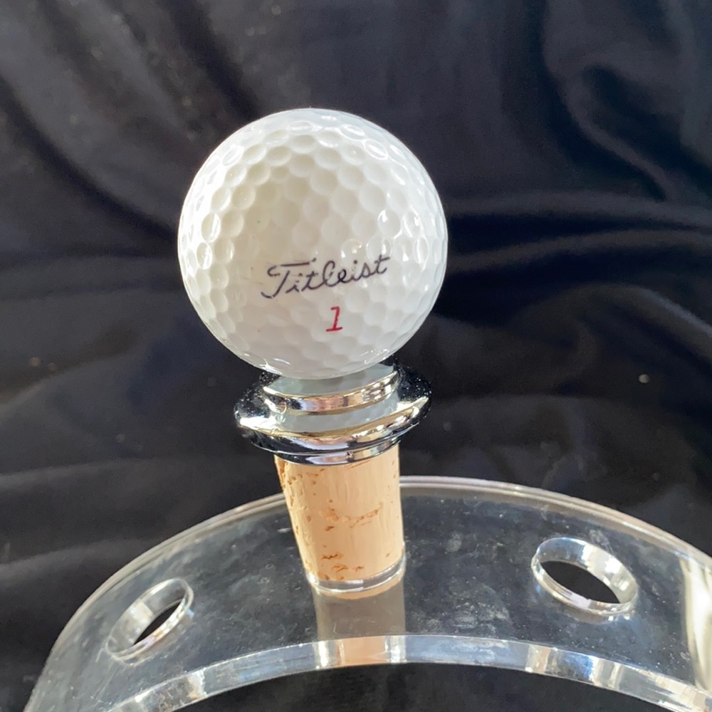 Golf ball bottle stopper
